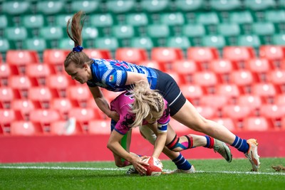 180426 - Bala v Machynlleth - WRU Women's National Bowl - Siwan Davies of Bala is tackled by Mared Ingram of Machynlleth but scores a try 