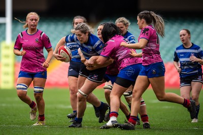 180426 - Bala v Machynlleth - WRU Women's National Bowl - Mari Elin Williams of Machynlleth is tackled by Gwenith Williams of Bala