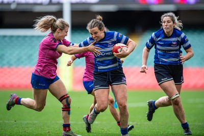 180426 - Bala v Machynlleth - WRU Women's National Bowl - Fflur Jones of Machynlleth is tackled by Siwan Davies of Bala