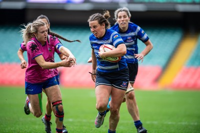 180426 - Bala v Machynlleth - WRU Women's National Bowl - Fflur Jones of Machynlleth is tackled by Siwan Davies of Bala
