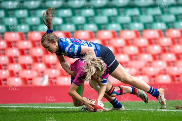 180426 - Bala v Machynlleth - WRU Women's National Bowl - Siwan Davies of Bala is tackled by Mared Ingram of Machynlleth but scores a try 