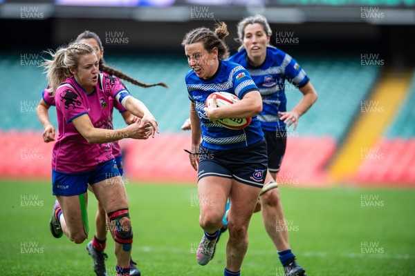 180426 - Bala v Machynlleth - WRU Women's National Bowl - Fflur Jones of Machynlleth is tackled by Siwan Davies of Bala