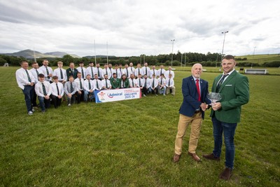 300526 - Admiral National League 3 North West League Presentation Bangor RFC - Alun Roberts, WRU North Wales representative presents Captain Calvin Williams with the trophy