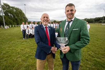 300526 - Admiral National League 3 North West League Presentation Bangor RFC - Alun Roberts, WRU North Wales representative presents Captain Calvin Williams with the trophy