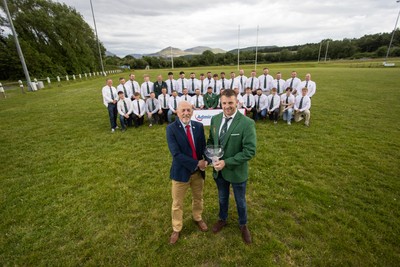 300526 - Admiral National League 3 North West League Presentation Bangor RFC - Alun Roberts, WRU North Wales representative presents Captain Calvin Williams with the trophy