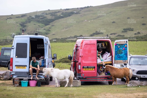 120623 - Picture shows shetland ponies saying hello to some friendly with campers in the shadow of the Offa�s Dyke path near Hay on Wye, South Wales