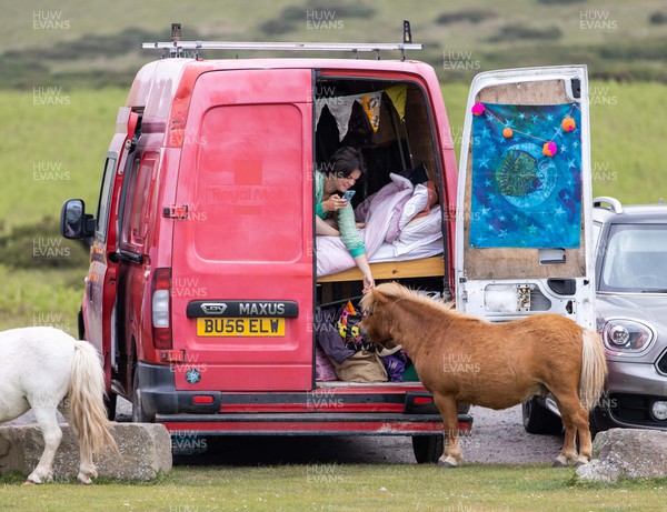 120623 - Picture shows shetland pony saying hello to a friendly camper in the shadow of the Offa�s Dyke path near Hay on Wye, South Wales