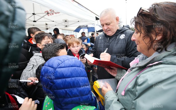 271119 - Barbarians Rugby Training Session, Penarth RFC - Head coach Warren Gatland signs autographs for local schoolchildren after the Barbarians training session at Penarth RFC ahead of their match against Wales