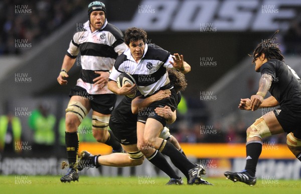 05.12.09 - Barbarians v New Zealand - The MasterCard Trophy - Jaque Fourie of Barbarians is tackled by Jason Eaton of New Zealand. 