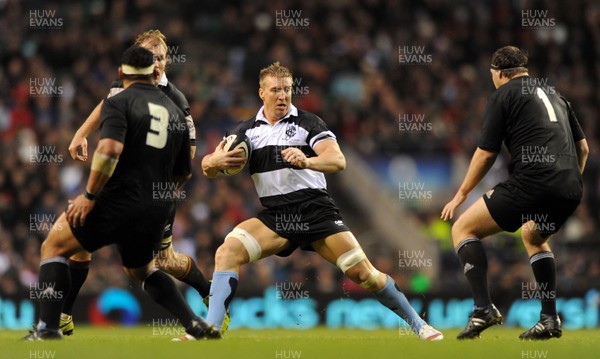 05.12.09 - Barbarians v New Zealand - The MasterCard Trophy - Andy Powell of Barbarians takes on John Afoa and Wyatt Crockett of New Zealand. 