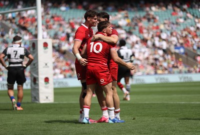 270626 - Barbarians v Wales - Friendly - Dan Edwards of Wales celebrates scoring a try with team mates