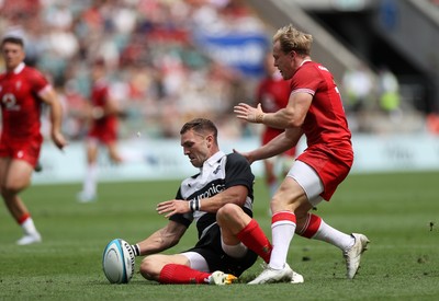 270626 - Barbarians v Wales - Friendly - George North of Barbarians is challenged by Blair Murray of Wales 