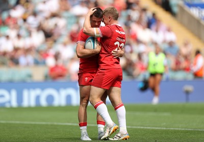 270626 - Barbarians v Wales - Friendly - Reuben Morgan-Williams of Wales celebrates scoring a try with Sam Costelow