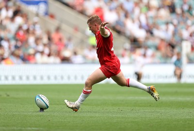 270626 - Barbarians v Wales - Friendly - Sam Costelow of Wales kicks the conversion