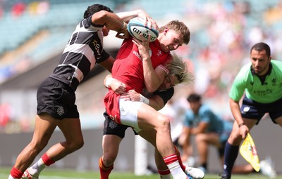 270626 - Barbarians v Wales - Ellis Mee of Wales is tackled by Faf de Klerk of Barbarian FC