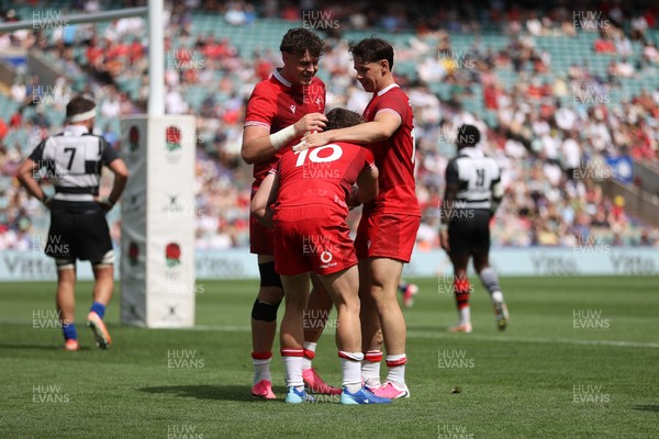 270626 - Barbarians v Wales - Friendly - Dan Edwards of Wales celebrates scoring a try with team mates