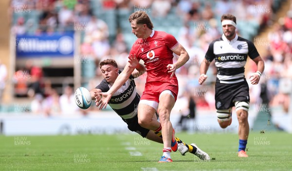270626 - Barbarians v Wales - Ellis Mee of Wales and Andrew Kellaway of Barbarians compete for the ball