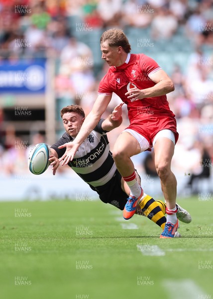 270626 - Barbarians v Wales - Ellis Mee of Wales and Andrew Kellaway of Barbarians compete for the ball