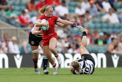 270626 - Barbarians Women v Wales Women - Friendly - Seren Lockwood of Wales is tackled by Liv McGoverne of Barbarians 