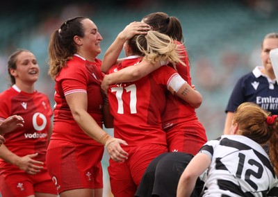 270626 - Barbarians Women v Wales Women - Friendly - Amy Williams of Wales celebrates scoring a try with team mates
