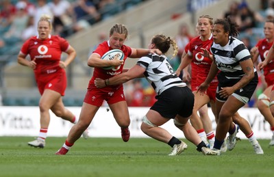 270626 - Barbarians Women v Wales Women - Friendly - Molly Reardon of Wales is tackled by Amy Rule of Barbarians 