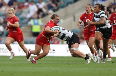 270626 - Barbarians Women v Wales Women - Friendly - Molly Reardon of Wales is tackled by Amy Rule of Barbarians 