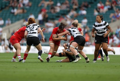 270626 - Barbarians Women v Wales Women - Friendly - Jorja Aiono of Wales is challenged by Amy Rule of Barbarians 