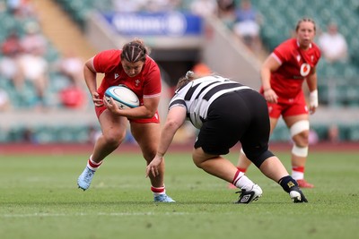 270626 - Barbarians Women v Wales Women - Friendly - Stella Orrin of Wales is tackled by Bryony Cleall of Barbarians 