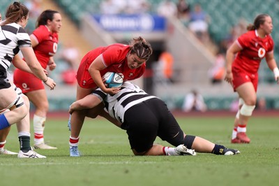 270626 - Barbarians Women v Wales Women - Friendly - Stella Orrin of Wales is tackled by Bryony Cleall of Barbarians 