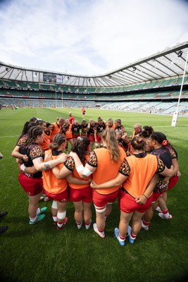 270626 - Barbarians v Wales Women - Wales huddle up ahead of the match