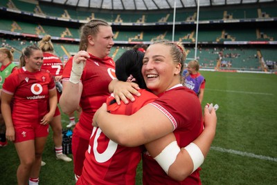 270626 - Barbarians v Wales Women - Lucy Isaac of Wales and Molly Reardon of Wales celebrate at the end of the match