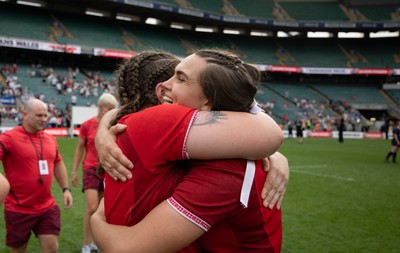 270626 - Barbarians v Wales Women - Bryonie King of Wales and Maisie Davies of Wales celebrate at the end of the match