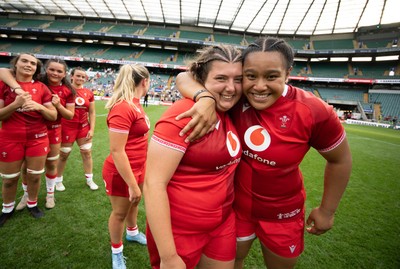 270626 - Barbarians v Wales Women - Stella Orrin of Wales and Sisilia Tuipulotu of Wales celebrate at the end of the match