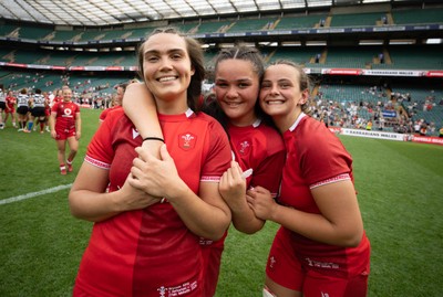 270626 - Barbarians v Wales Women - Bryonie King of Wales, Jorja Aiono of Wales and Branwen Metcalfe of Wales celebrate at the end of the match