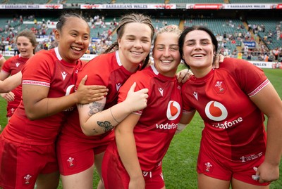 270626 - Barbarians v Wales Women - Jenna De Vera of Wales, Maisie Davies of Wales, Molly Reardon of Wales and Lucy Isaac of Wales celebrate at the end of the match