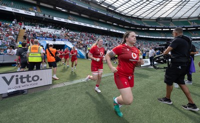 270626 - Barbarians v Wales Women - Maisie Davies of Wales runs out at the start of the match