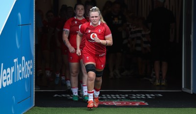 270626 - Barbarians v Wales Women - Alex Callender of Wales runs out at the start of the match