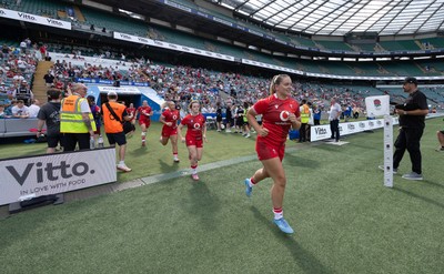 270626 - Barbarians v Wales Women - Freya Bell of Wales runs out at the start of the match