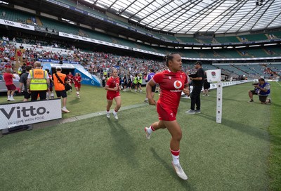 270626 - Barbarians v Wales Women - Jenna De Vera of Wales runs out at the start of the match
