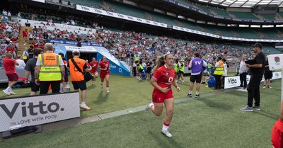 270626 - Barbarians v Wales Women - Kayleigh Powell of Walesruns out at the start of the match