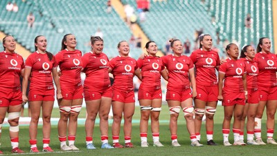 270626 - Barbarians v Wales Women - Wales line up for the anthems Left to right, Katherine Baverstock, Nel Metcalfe, Branwen Metcalfe, Stella Orrin, Molly Reardon, Lucy Isaac, Alisha Joyce, Bryonie King, Jenna De Vera, Kayleigh Powell and Courtney Keight