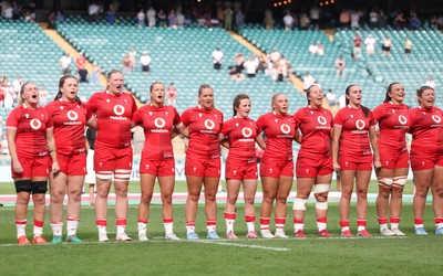 270626 - Barbarians v Wales Women - Wales line up for the anthems Left to right, Alex Callender, Maisie Davies, Alaw Pyrs, Amy Williams, Freya Bell, Lily Hawkins, Kelsie Webster, Katherine Baverstock, Nel Metcalfe, Branwen Metcalfe and Stella Orrin
