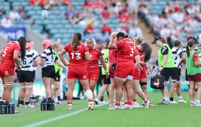 270626 - Barbarians v Wales Women - Wales players during the drinks break