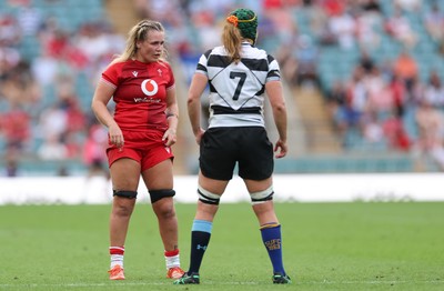 270626 - Barbarians v Wales Women - Alex Callender of Wales with Emily Chancellor of Barbarians