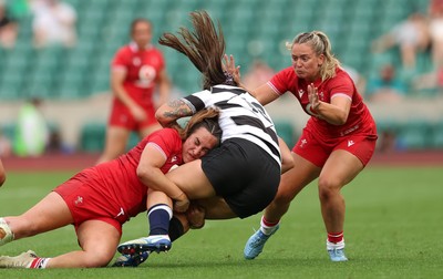 270626 - Barbarians v Wales Women - Courtney Keight of Wales puts in a tackle