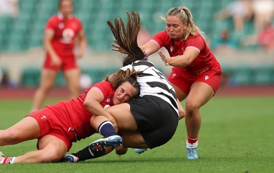 270626 - Barbarians v Wales Women - Courtney Keight of Wales puts in a tackle