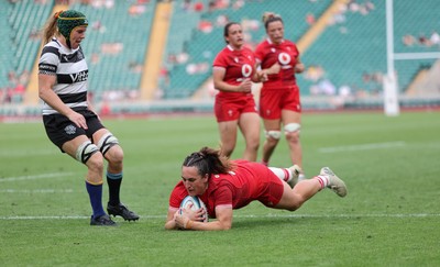 270626 - Barbarians v Wales Women - Courtney Keight of Wales races in to score try