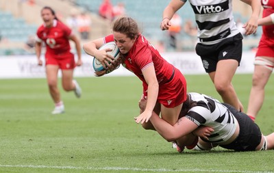 270626 - Barbarians v Wales Women - Lily Hawkins of Wales is tackled just short of the line