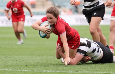 270626 - Barbarians v Wales Women - Lily Hawkins of Wales is tackled just short of the line