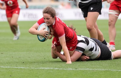 270626 - Barbarians v Wales Women - Lily Hawkins of Wales is tackled just short of the line
